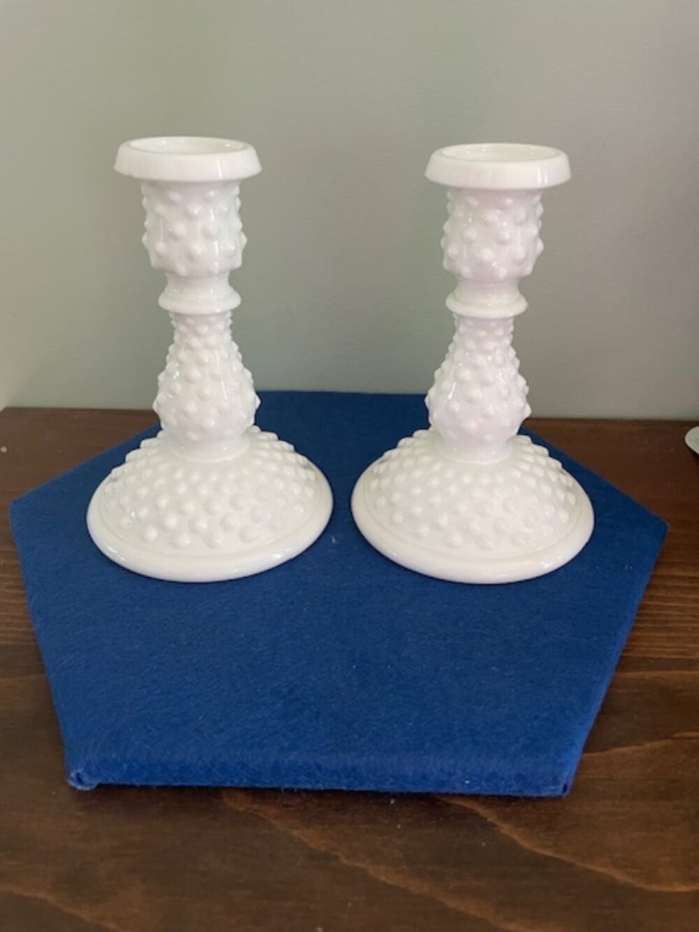 Pair of Fenton hobnail milk glass taper candlestick holders, 6" tall